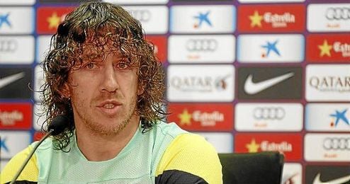 Carles Puyol, durante la rueda de prensa tras el entrenamiento de hoy. Carles Puyol, durante la rueda de prensa tras el entrenamiento de hoy.