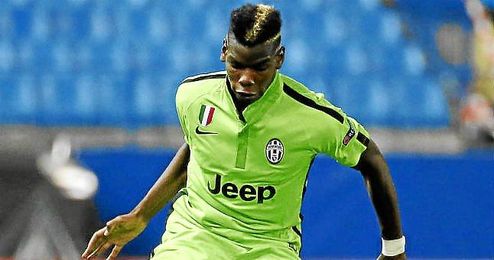 Pogba disputa un balón en el encuentro de la Liga de Campeones ante el Atlético de Madrid. Pogba disputa un balón en el encuentro de la Liga de Campeones ante el Atlético de Madrid.