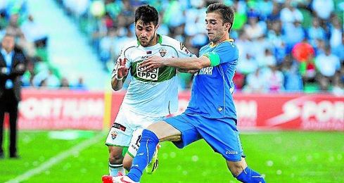 El medio jugando en el Elche El medio jugando en el Elche
