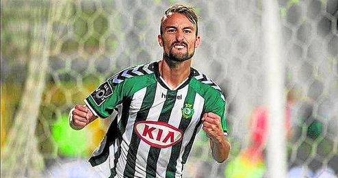 Una imagen del jugador con la camiseta de su actual equipo. Una imagen del jugador con la camiseta de su actual equipo.