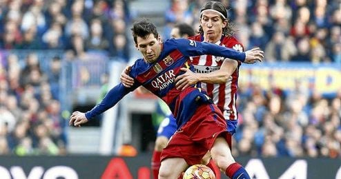 En la imagen, Filipe y Messi durante el partido. En la imagen, Filipe y Messi durante el partido.