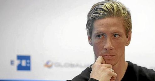 Torres durante un evento. Torres durante un evento.