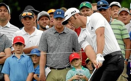 Rahm resiste y Kisner y Matsuyama dominan bajo la lluvia. Rahm resiste y Kisner y Matsuyama dominan bajo la lluvia.