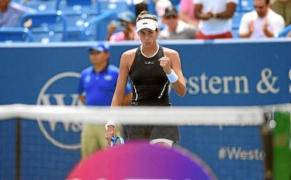Muguruza cierra el puño celebrando un punto ante Pliskova. Muguruza cierra el puño celebrando un punto ante Pliskova.