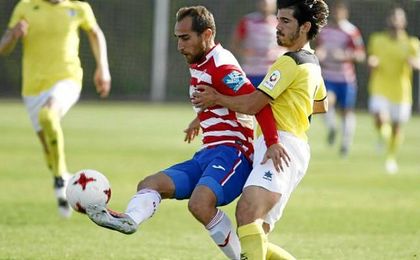Lance del encuentro entre el Granada B y el Écija. Lance del encuentro entre el Granada B y el Écija.
