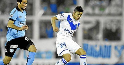 Lucas Romero en un partido con Vélez Sarsfield ante Belgrano. Lucas Romero en un partido con Vélez Sarsfield ante Belgrano.