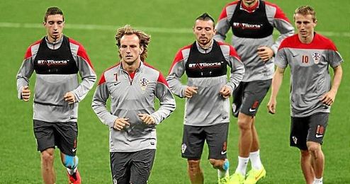 Rakitic, durante el entrenamiento de ayer en el Arena Corinthians. Rakitic, durante el entrenamiento de ayer en el Arena Corinthians.