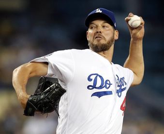 7-2. Hill afianza a los Dodgers en el liderato 7-2. Hill afianza a los Dodgers en el liderato